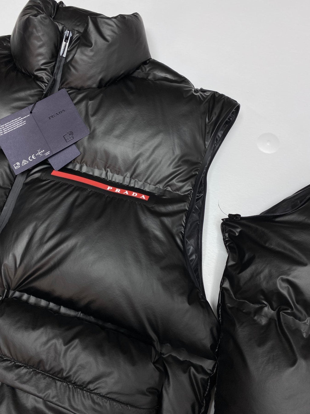 Prada Black Convertible Puffer Jacket with Red Chest Stripe