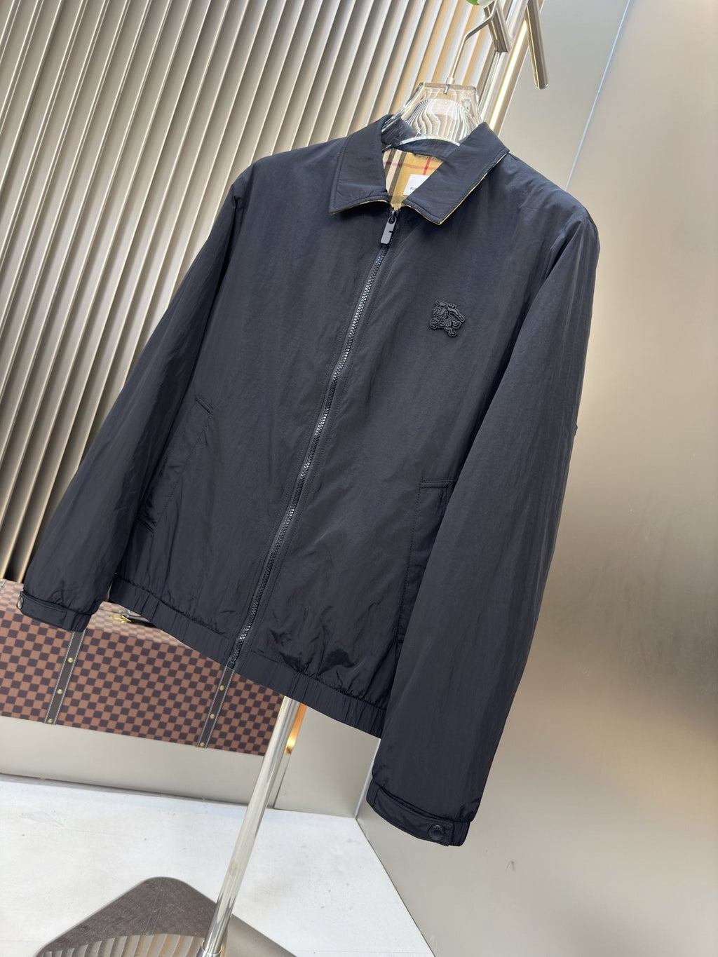 Moncler Black Zip-Front Jacket with Checked Lining