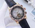 Omega Gold Black Strap Watch